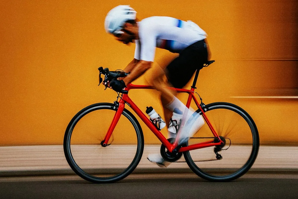 Cyclist in motion showcasing endurance and recovery