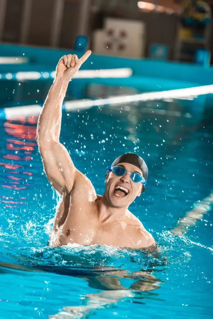 Competitive swimmer showing peak athletic performance